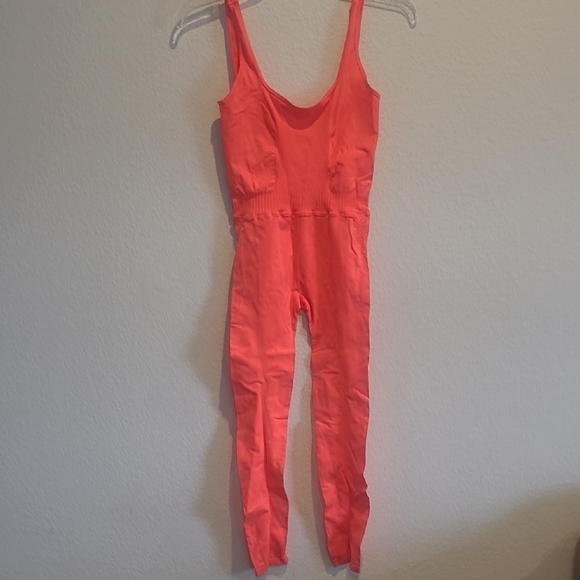 Free People Movement Neon Orange Sleeveless Open Back Jumpsuit Size XS/S NWOT - Picture 5 of 15